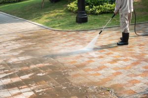 Concrete pressure washing for deep cleaning and restoration